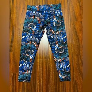 MinkPink women’s large Move 7/8 leggings, feather leaf print, blue orange white